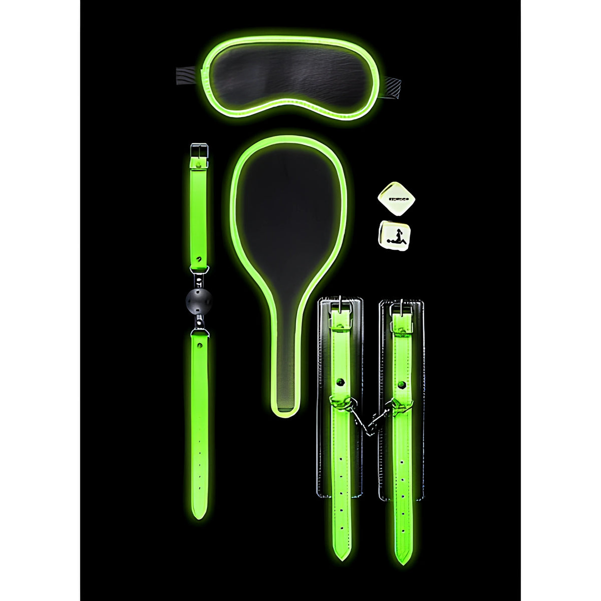 BDSM комплект Glow in the Dark на Shots: маска за очи, топка за уста, палета, белезници и две зарчета, всички с неоново зелени кантове на черен фон