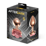 Кутия на Pink Rose размер S в розово злато с надпис After Dark, с изображение на аксесоара с роза и страничен изглед в реален размер