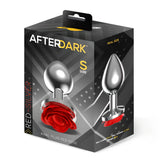 Кутия на Анален разширител Red Rose размер S от AfterDark: сребрист метален накрайник с червена роза в основата и надпис „Real size“