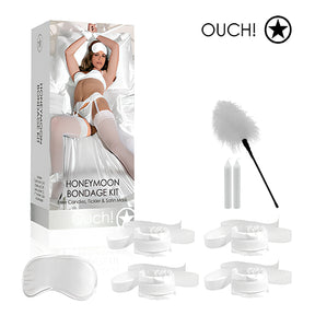 BDSM комплект Honeymoon на Ouch!: кутия и съдържание – бяла сатенена маска, четири маншета, перце и две свещи