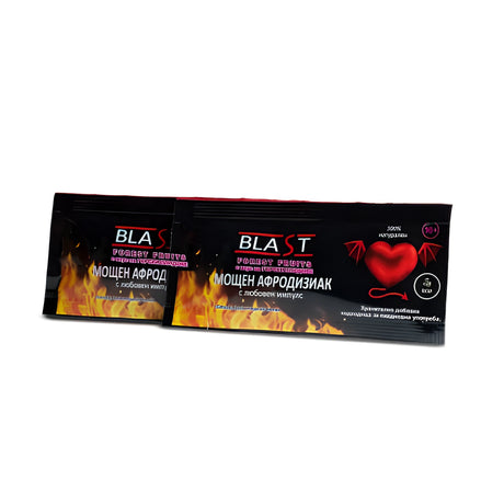 Две черни сашета Blast с вкус Forest Fruits, с пламъци и червено сърце с криле, надпис „Мощен афродизиак с любовен импулс“