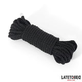 Навито черно усукано въже Fetish Addict, 10 м, на бял фон, с лого LATETOBED BDSM Line в долния десен ъгъл