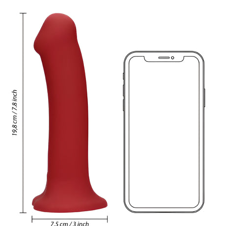 Червено дилдо Non-Phallic Vibrating Large с размери 19,8 см височина и 7,5 см ширина на основата, до контур на смартфон за сравнение