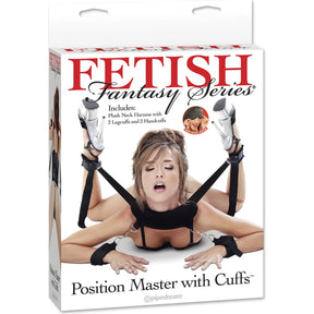 Предна страна на кутията на Fetish Fantasy Series Position Master with Cuffs на Pipedream: модел с черния комплект с яка и маншети и надпис за включена маска