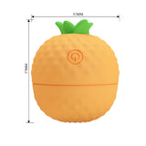 Pineapple Secret във вид на оранжев ананас със зелени листа и бутон за включване, с размери 57 мм височина и 51 мм ширина