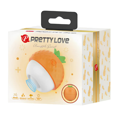 Кутия на Pretty Love Pineapple Secret с оранжев стимулатор във формата на ананас, бяло тяло и сини детайли, и икони на опаковката