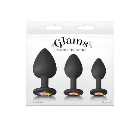 Опаковка на комплект Glams Spades Trainer Kit на NS Novelties с три черни силиконови аксесоара в различни размери и цветни кристали в основата