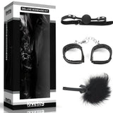 Комплект Deluxe Bondage Kit Black III на Lovetoy: черна кутия и до нея топка с каишка, white белезници с верига и пухкава перушина