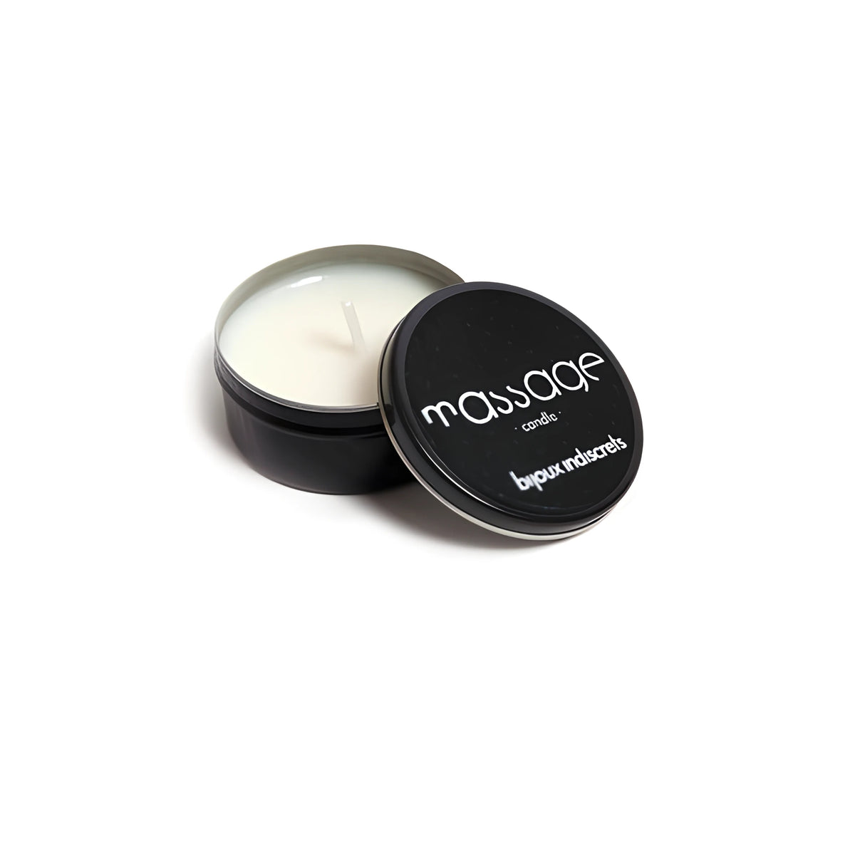 Отворена черна метална кутия с бяла масажна свещ Massage candle на Bijoux Indiscrets, капакът с логото е подпрян отпред