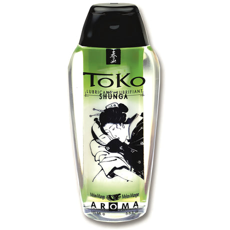 Прозрачна бутилка Shunga Toko Aroma с черна капачка и зелен етикет с вкус пъпеш и манго, 165 мл, с японска илюстрация