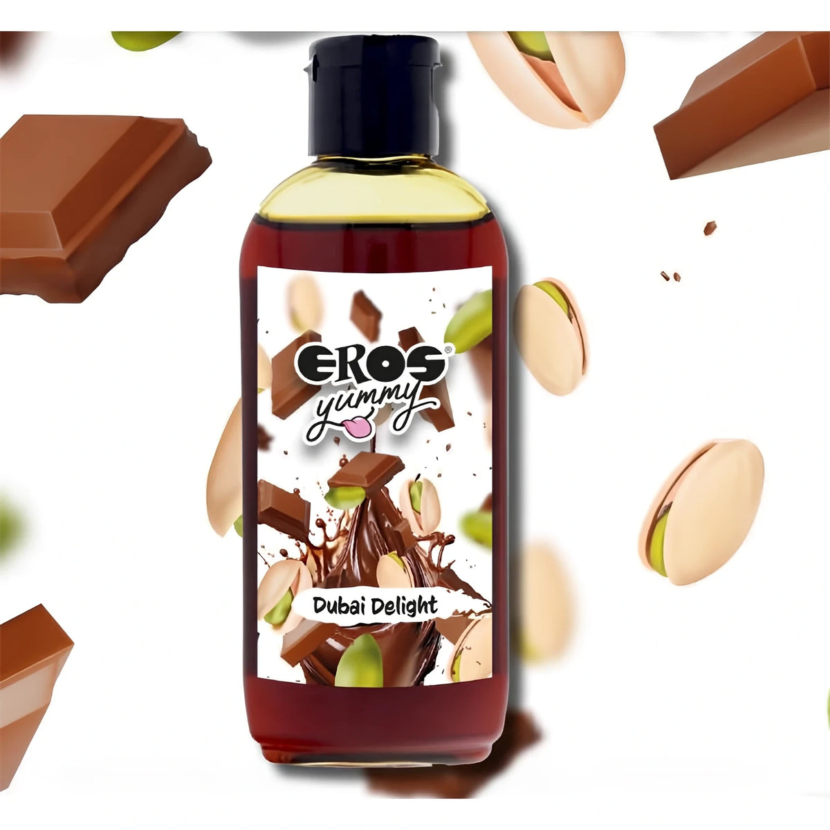 Бутилка Eros Yummy Dubai Delight 100 ml с черна капачка и етикет с шоколад и шамфъстък сред летящи парчета шоколад
