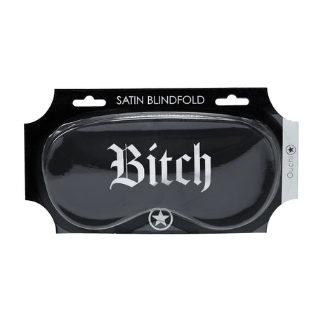 Черна сатенена маска за очи Ouch! в опаковка с надпис Satin Blindfold, с бял готически надпис Bitch и лого със звезда