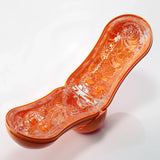 TENGA FLIP ORB Sunset Orange в оранжев корпус, отворен като две половини; вътре се виждат прозрачни релефни сферични шарки