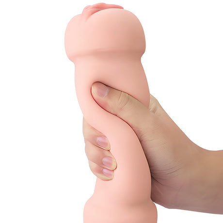 Мастурбатор Training Master Double Side Stroker на Lovetoy в телесен цвят, държан в ръка, за да се покаже мекият гъвкав материал и размерът