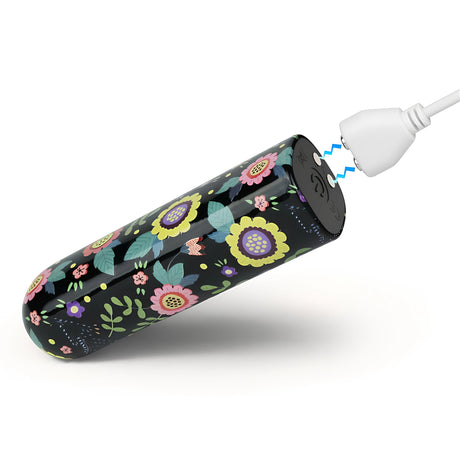 Мини вибратор Diana на Lovetoy с черен корпус и цветя, с магнитен USB кабел за зареждане, поставян към основата му