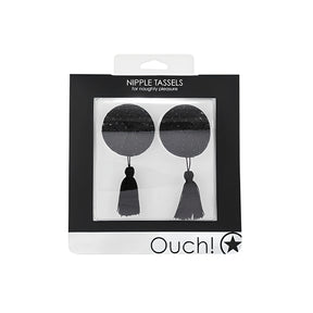 Кръгли черни пастиси с пискюли на Ouch! в кутия с прозрачен прозорец и надпис Nipple Tassels, for naughty pleasure