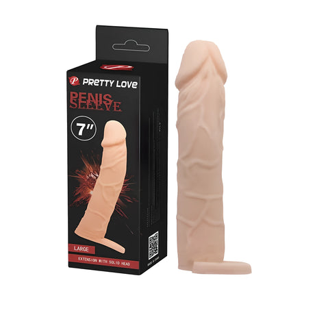 Пенис удължител Pretty Love в телесен цвят до черната си кутия с надпис 7" Large и Extension with solid head