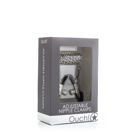 Сива кутия на Ouch! Adjustable Nipple Clamps с прозорец, през който се виждат метална верига и регулируеми щипки