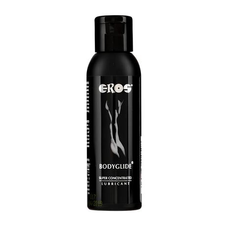 Черна бутилка Eros Bodyglide 50 мл с капаче, отпред с надпис Super Concentrated Lubricant и бяла графика на силует