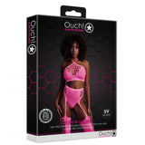 Черна кутия на Ouch! Glow in the Dark с модел в неоново розов crop top и жартиери с чорапи, надпис UV Active, ъглов изглед