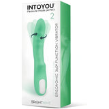 Зелена кутия на вибратор Brightmint на IntoYou с надпис „Ergonomic 360° function vibrator“ и стрелки за въртене на върха