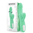 Вибратор IntoYou Brightpear в мента зелено до бялата си кутия с надпис „Ergonomic 360° function rabbit vibrator“ и 2 мотора
