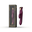 Вибратор Zalo Mose в цвят Velvet Purple със златист елемент до черната им кутия с египетски орнаменти