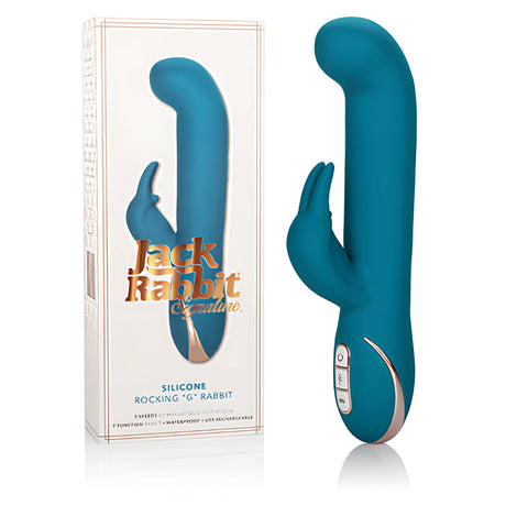 Вибратор Rocking G Rabbit Signature в петролено синьо до бялата си кутия с надпис Jack Rabbit Signature и Silicone Rocking G Rabbit