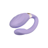 Лавандулов вибратор за двойки LELO TIANI Twist с извито тяло и златист елемент в средата, гледан отгоре отстрани на бял фон