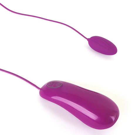 Виброяйце Bnaughty Deluxe Purple в лилав цвят: овалната част и дистанционното с бутон, свързани с тънки кабели