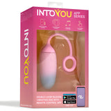 Розова кутия на виброяйце IntoYou App Series с прозорец към розово-синьо яйце с пръстен и текст за контрол през приложение