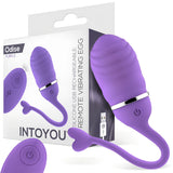 Виброяйце Odise на IntoYou в лилав цвят с дистанционно управление пред бялата си кутия с надпис Remote Vibrating Egg