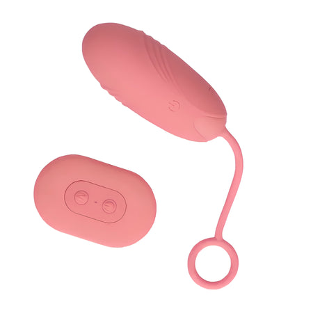 Розово виброяйце Ultra Soft Silicone с ребрена повърхност и пръстен за издърпване, до малкото овално дистанционно с два бутона