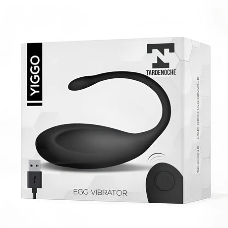 Бяла кутия на Виброяйце Yiggo на Tardenoche с черно яйце, дистанционно, USB кабел и надписи „Silicone“ и „USB rechargeable“